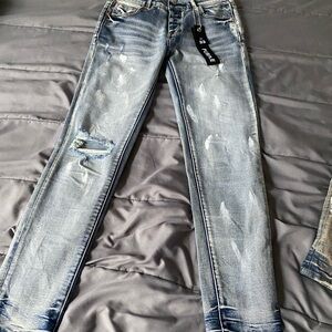 Light Blue Skinny Jeans with Vintage Distressing